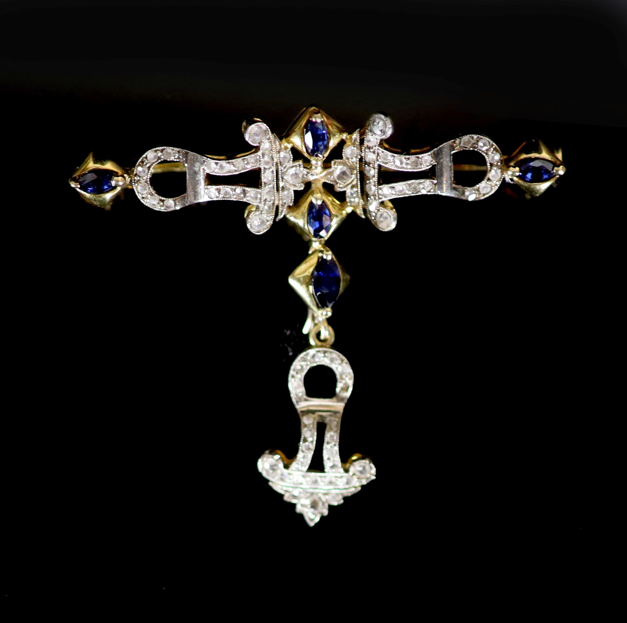 A mid 20th century gold, sapphire and diamond set drop openwork bar brooch